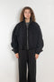 The Nylon Jacket by Acne Studios is crafted in a technical nylon with a peach finish. Constructed with a high neckline