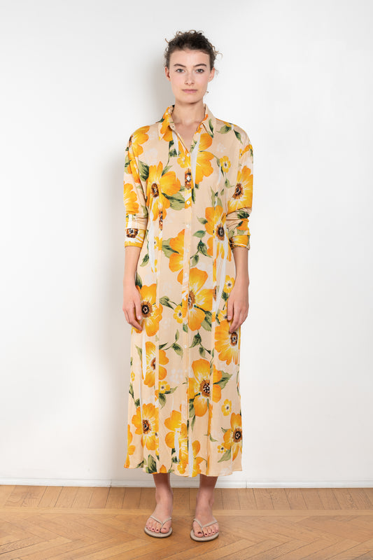 The Printed Dress by Acne Studios is a long sleeve shirt dress crafted in a fluid jersey adorned with a season flower print
