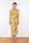 The Printed Dress by Acne Studios is a long sleeve shirt dress crafted in a fluid jersey adorned with a season flower print