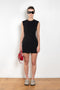 The Short Sleeve Dress by Acne Studios is a tailored dress made from a wool blend, detailed with darts along the waist