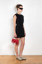 The Short Sleeve Dress by Acne Studios is a tailored dress made from a wool blend, detailed with darts along the waist