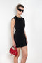 The Short Sleeve Dress by Acne Studios is a tailored dress made from a wool blend, detailed with darts along the waist