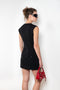 The Short Sleeve Dress by Acne Studios is a tailored dress made from a wool blend, detailed with darts along the waist
