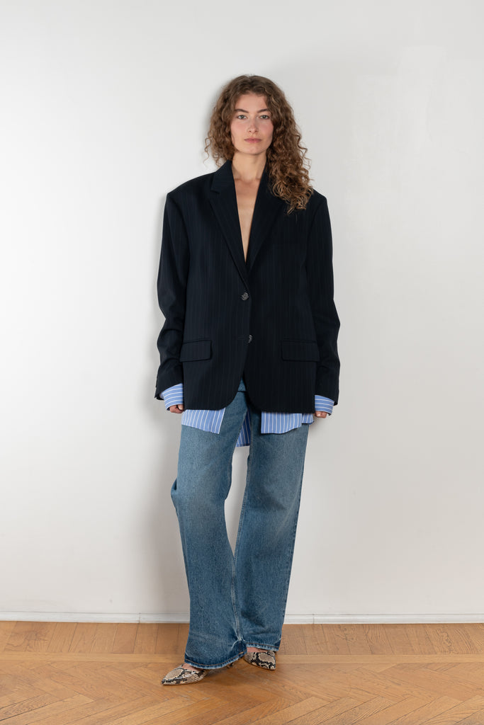The Single-breasted suit jacket by Acne Studios is crafted fluid pinstriped fabric with layered shirting detailing