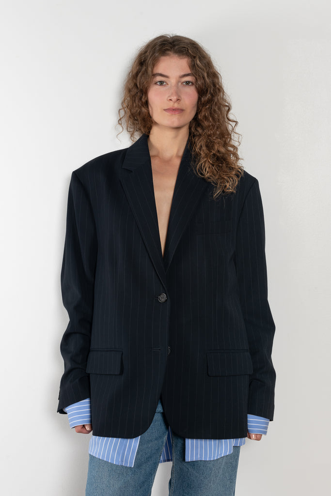 The Single-breasted suit jacket by Acne Studios is crafted fluid pinstriped fabric with layered shirting detailing