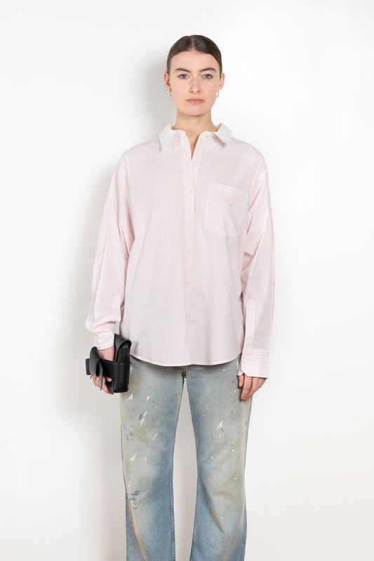 The Back and Front Buttoned Shirtby Acne Studios is cut to a relaxed fit and below hip length with back and front buttoning