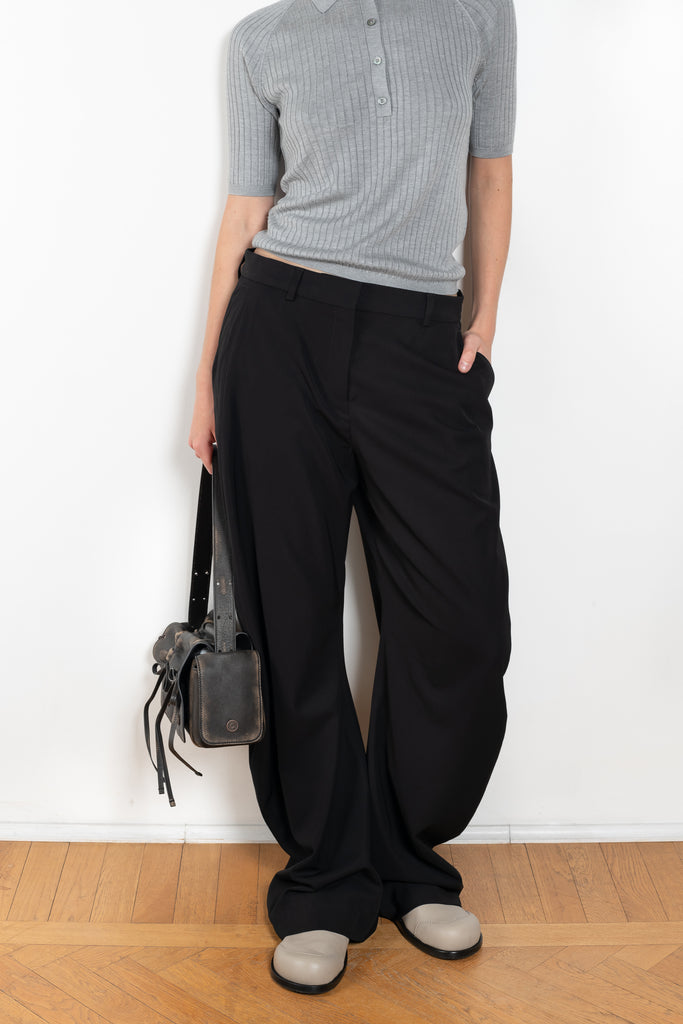 The Tailored Trouser by Acne Studios are crafted from a dense sartorial fabric with a curved drape leg