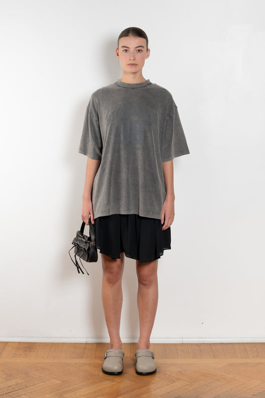 The Tshirt Dress by Acne Studios is a short-sleeve T-shirt dress featuring a layered construction