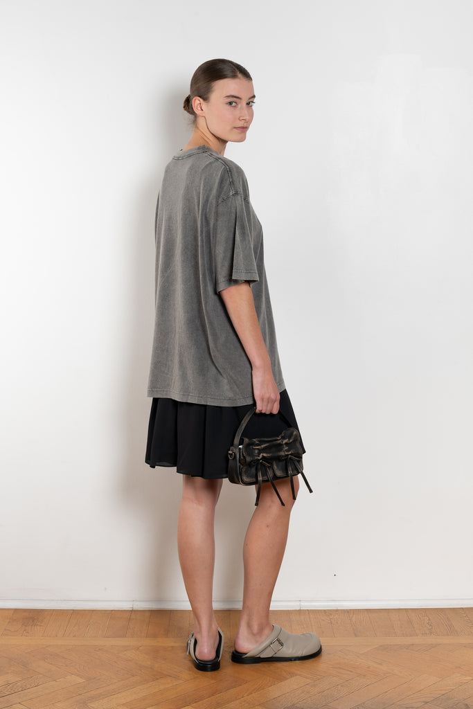 The Tshirt Dress by Acne Studios is a short-sleeve T-shirt dress featuring a layered construction