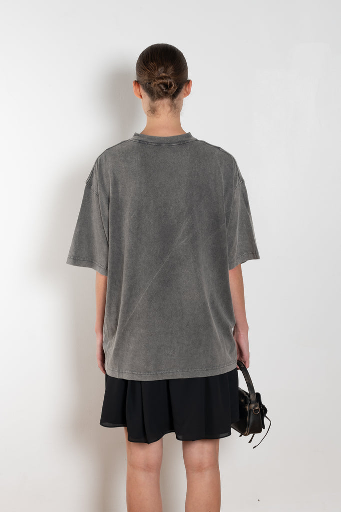 The Tshirt Dress by Acne Studios is a short-sleeve T-shirt dress featuring a layered construction