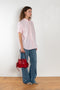 The Cuffed Sleeve Shirt by Acne Studios is a button-up shirt crafted from 100% organic cotton, featuring short tailored cuff sleeves