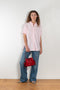 The Cuffed Sleeve Shirt by Acne Studios is a button-up shirt crafted from 100% organic cotton, featuring short tailored cuff sleeves