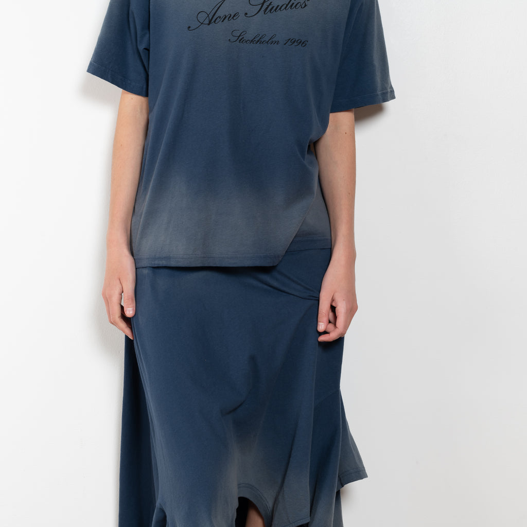 The Deconstructed Tshirtdress by Acne studios is a layered dress with a deconstructed tshirt skirt part