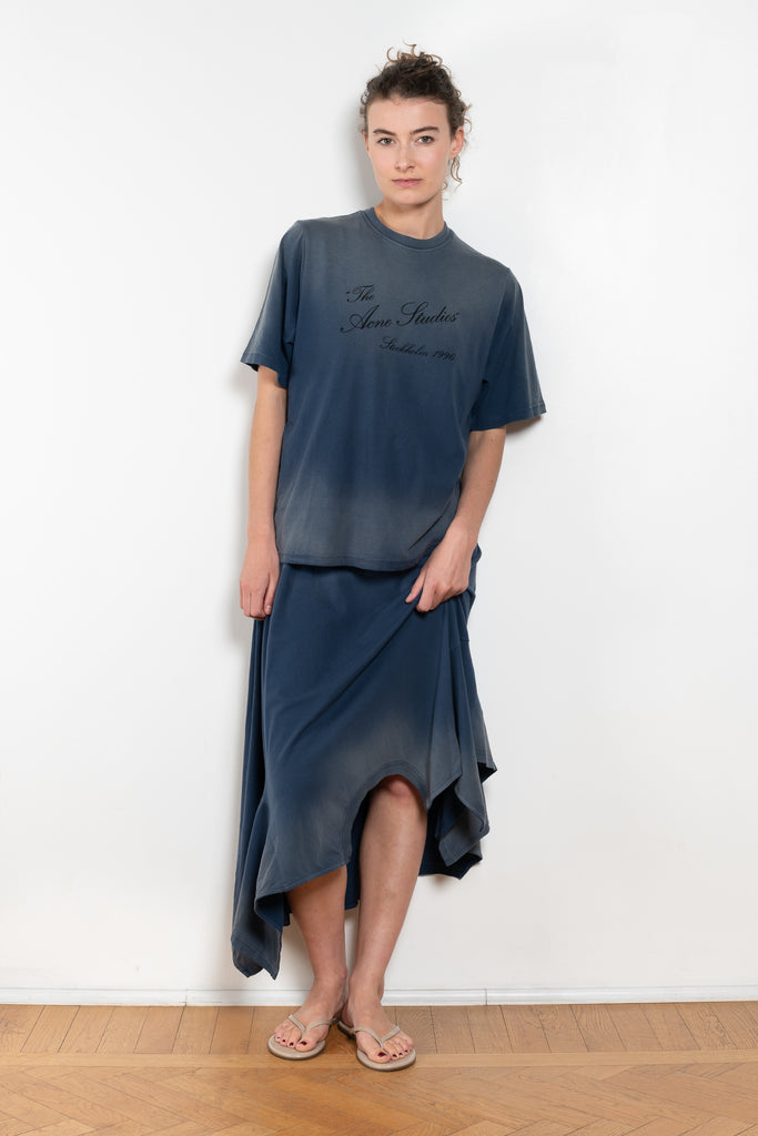 The Deconstructed Tshirtdress by Acne studios is a layered dress with a deconstructed tshirt skirt part