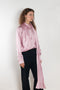The Layered Satin Shirt by Acne Studios is a button-up shirt blouse crafted from lightweight, fluid satin fabric, featuring constructed scarf detailing