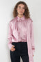 The Layered Satin Shirt by Acne Studios is a button-up shirt blouse crafted from lightweight, fluid satin fabric, featuring constructed scarf detailing