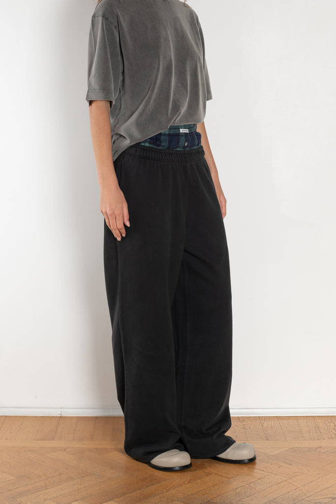 The Loose fit trousers by Acne Studios are relaxed joggers with an integrated boxer. Cut to a loose fit, wide leg and long length.