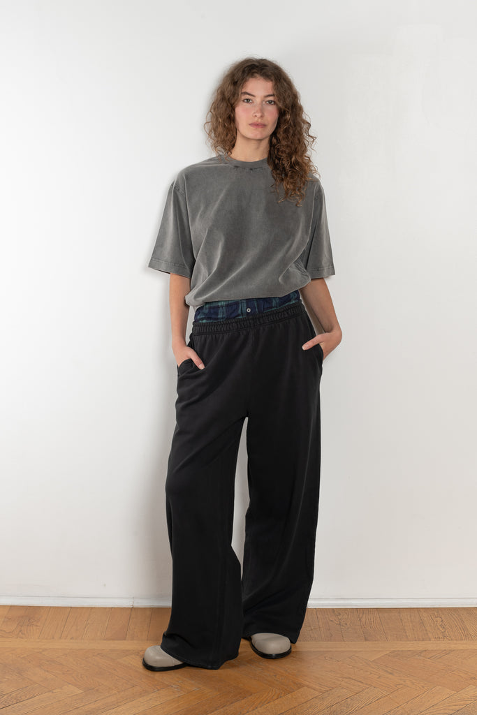 The Loose fit trousers by Acne Studios are relaxed joggers with an integrated boxer. Cut to a loose fit, wide leg and long length.