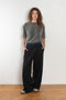 The Loose fit trousers by Acne Studios are relaxed joggers with an integrated boxer. Cut to a loose fit, wide leg and long length.