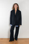 The Pinstripe Trouser by Acne Studios feature a pinstripe pattern crafted from a soft fluid fabric. Cut to a regular fit with a mid-waist, bootcut leg and extra long length.