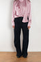 The Pinstripe Trouser by Acne Studios feature a pinstripe pattern crafted from a soft fluid fabric. Cut to a regular fit with a mid-waist, bootcut leg and extra long length.