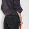 The 2021 Loose Fit Jeans by Acne Studios are cut to a loose fit with mid-waist, wide leg and long length