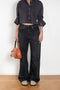 The 2021 Loose Fit Jeans by Acne Studios are cut to a loose fit with mid-waist, wide leg and long length