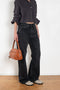 The 2021 Loose Fit Jeans by Acne Studios are cut to a loose fit with mid-waist, wide leg and long length