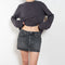 The Alek Mini Skirt by Agolde is a signature 5 pocket mini skirt crafted in a non stretch cotton