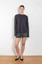 The Alek Mini Skirt by Agolde is a signature 5 pocket mini skirt crafted in a non stretch cotton
