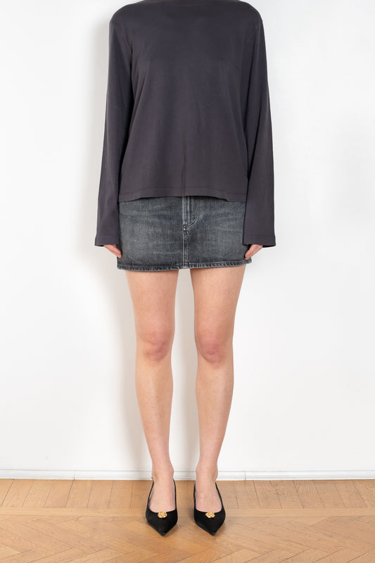 The Alek Mini Skirt by Agolde is a signature 5 pocket mini skirt crafted in a non stretch cotton