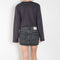The Alek Mini Skirt by Agolde is a signature 5 pocket mini skirt crafted in a non stretch cotton