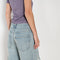 The Emmi Short by Agolde has a long inseam, perfect for a slouchy look, and is cinched with a thin denim belt for added style