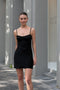 The Mini Waterlily Dress by Anna October is a signature lightweight summer dress with an open back and lingerie details