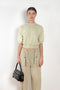 The Half Sleeved Sweat by Auralee is a cropped sweater with a half sleeve in a high quality ultra fine cotton