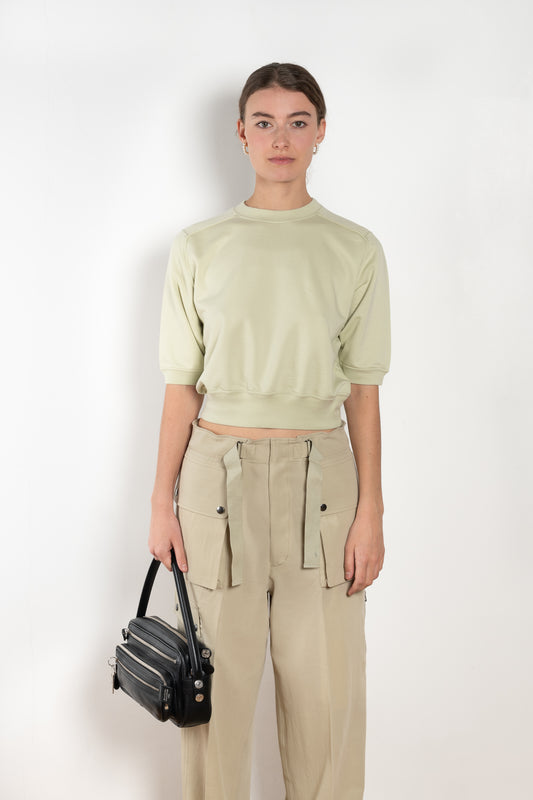 The Half Sleeved Sweat by Auralee is a cropped sweater with a half sleeve in a high quality ultra fine cotton