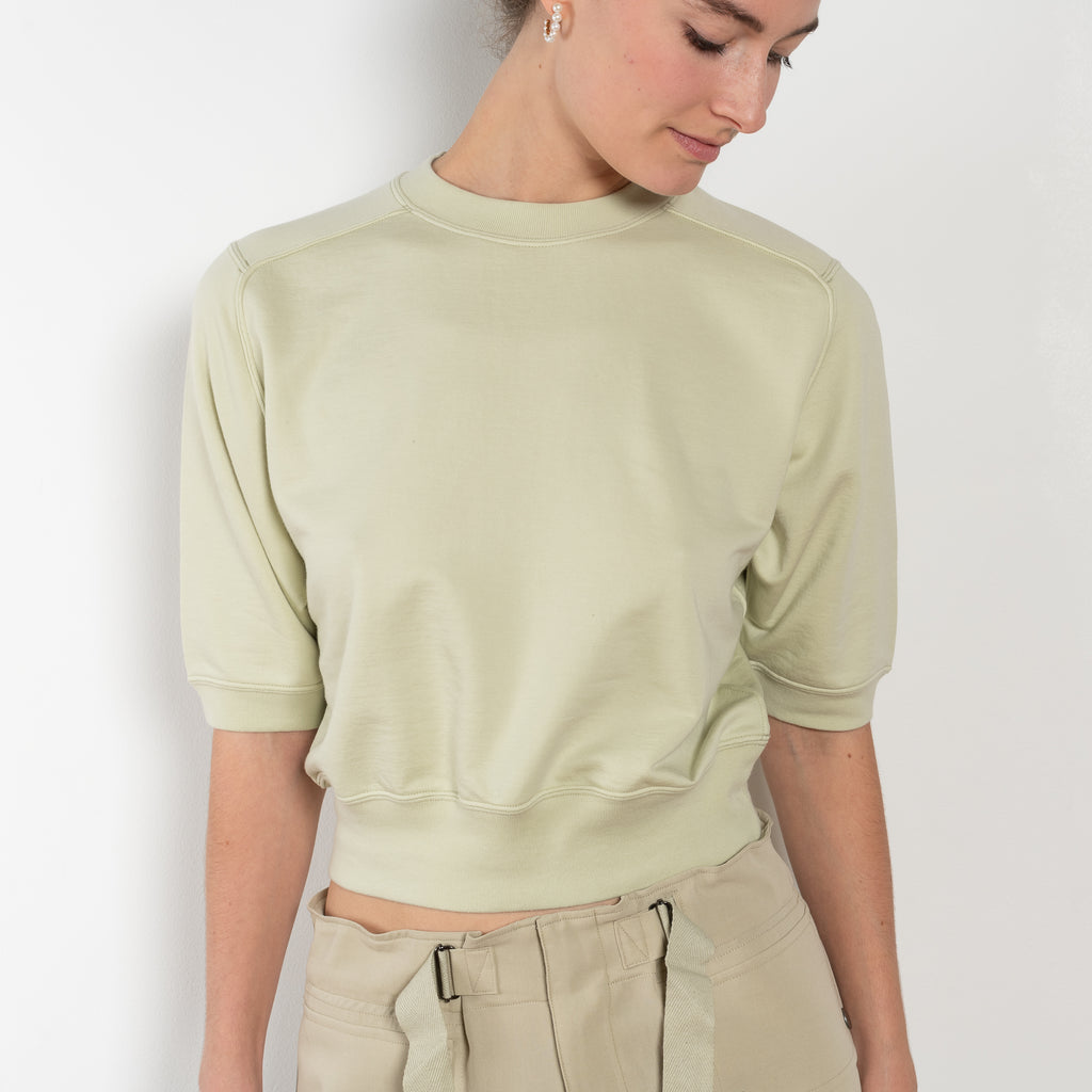 The Half Sleeved Sweat by Auralee is a cropped sweater with a half sleeve in a high quality ultra fine cotton