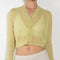The Mohair Sheer Cardigan by Auralee is a fine knitted cardigan with a delicate, luxurious transparency