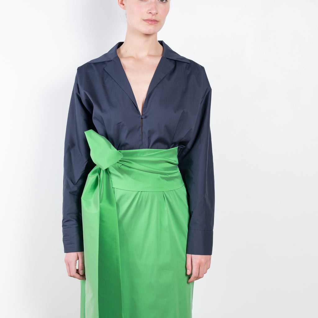 The Dress Claire by Bernadette is cut from both cotton poplin on top and crisp taffeta on the bottom with a removable waist bow belt for versatile wear