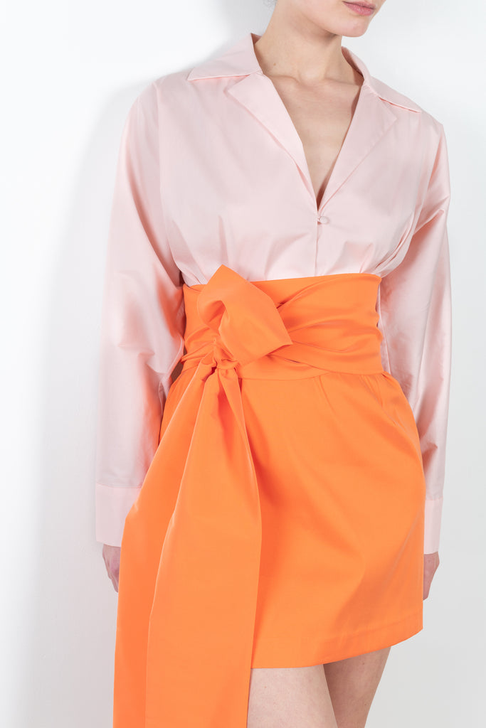 The Short Dress Claire by Bernadette is cut from both cotton poplin on top and crisp taffeta on the bottom with a removable waist bow belt for versatile wear