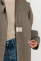 The Cordelia Coat by Bite is crafted from high-quality houndstooth check wool with a oversized silhouette