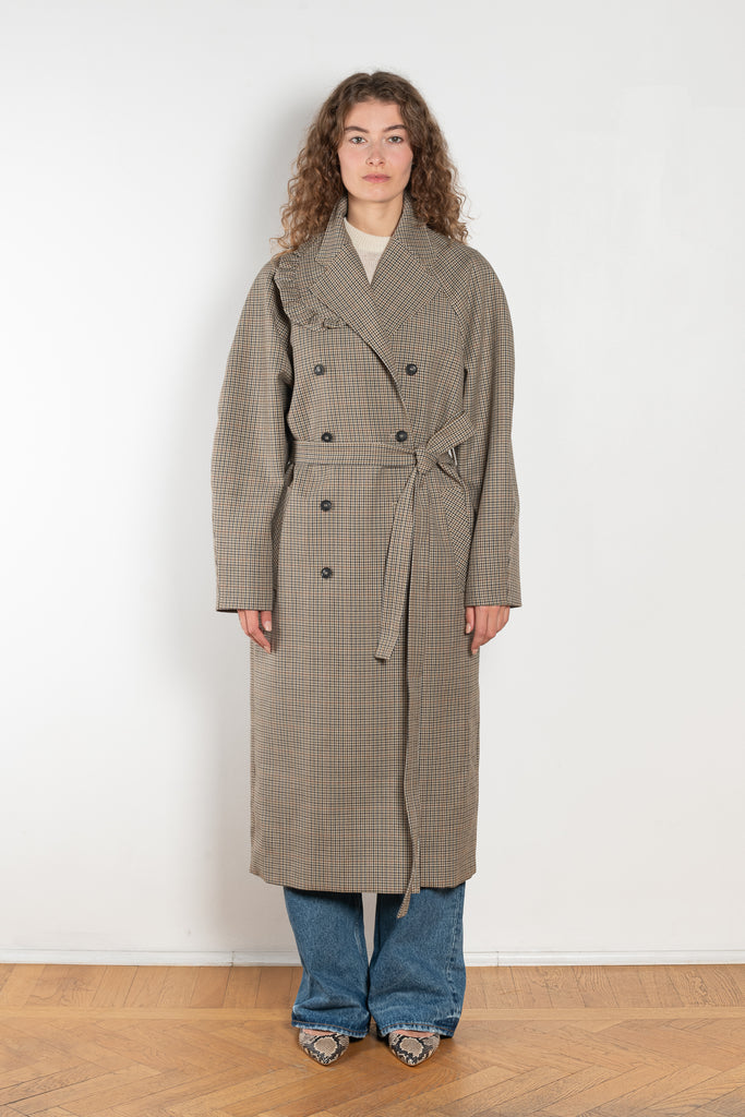 
The Cordelia Coat by Bite is crafted from high-quality houndstooth check wool with a oversized silhouette