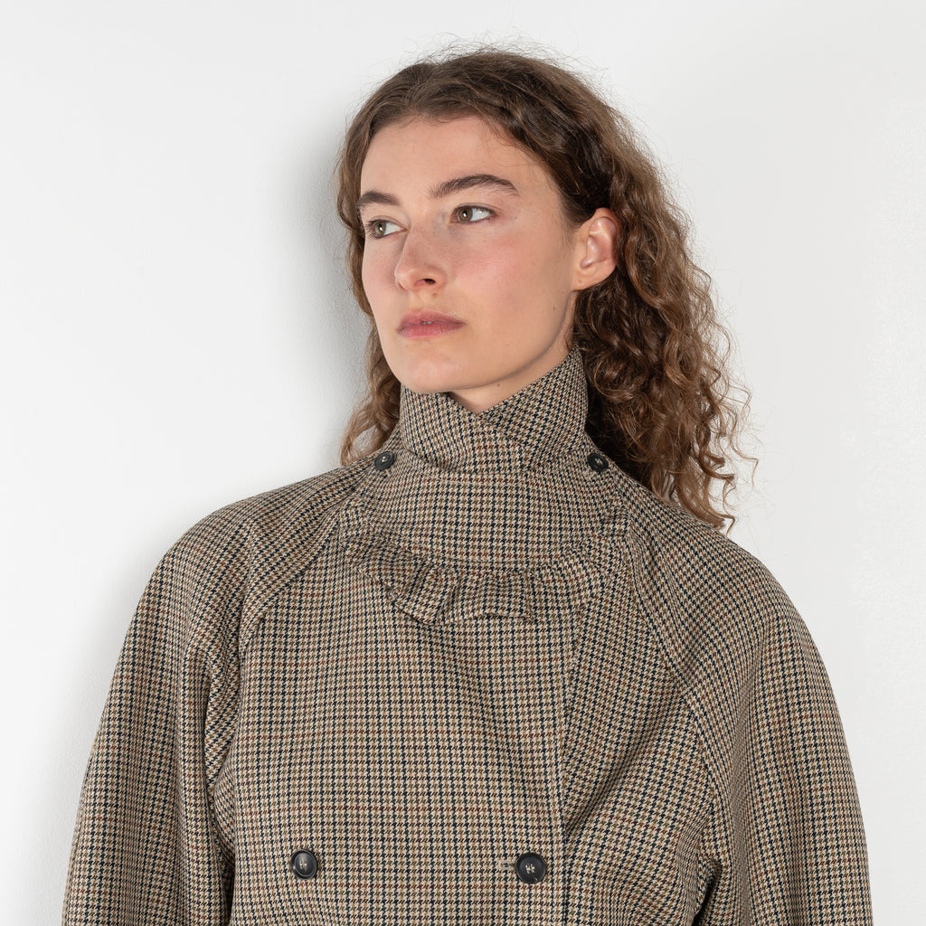 The Cordelia Coat by Bite is crafted from high-quality houndstooth check wool with a oversized silhouette