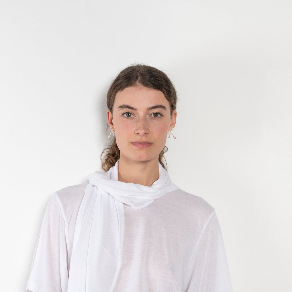 The Ludo Sheer tee by Bite is is crafted from luxurious fine cotton jersey crepe featuring a relaxed, oversized silhouette, elevated by a detachable scarf detail