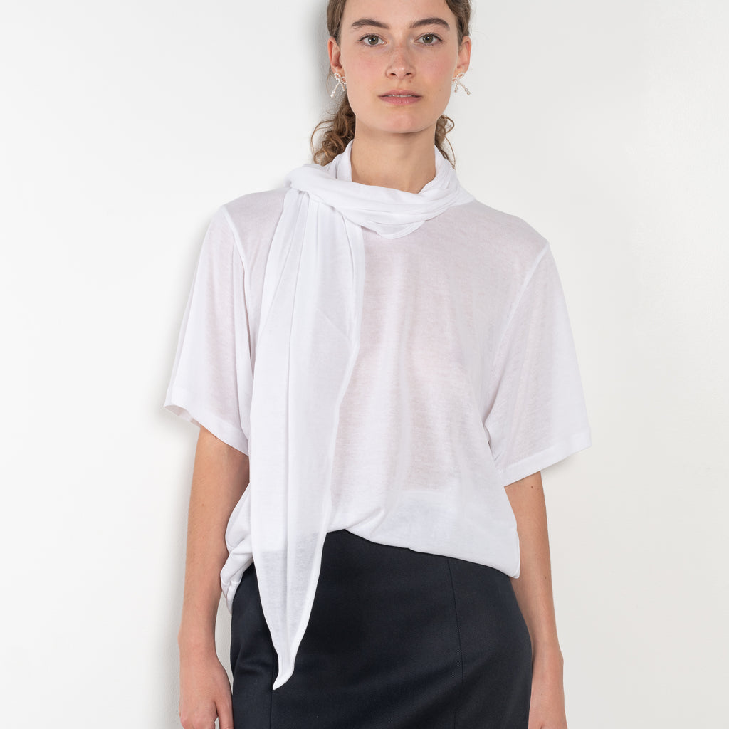 The Ludo Sheer tee by Bite is is crafted from luxurious fine cotton jersey crepe featuring a relaxed, oversized silhouette, elevated by a detachable scarf detail