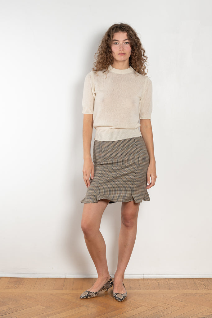The Arista Flared Skirt by Bite is crafted from high-quality houndstooth check wool with a subtle fluted hem and an invisible side seam closure