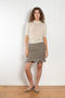 The Arista Flared Skirt by Bite is crafted from high-quality houndstooth check wool with a subtle fluted hem and an invisible side seam closure