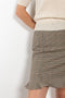 The Arista Flared Skirt by Bite is crafted from high-quality houndstooth check wool with a subtle fluted hem and an invisible side seam closure
