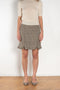 The Arista Flared Skirt by Bite is crafted from high-quality houndstooth check wool with a subtle fluted hem and an invisible side seam closure