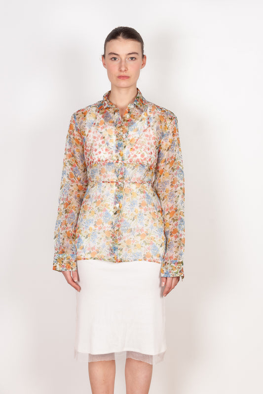 The Bikini Shirt by Botter is a floral silk shirt with a integrated bikini detail to tie in the back